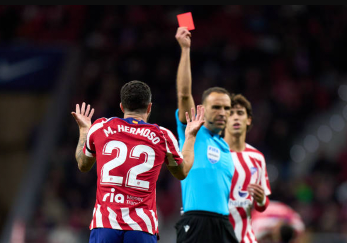 Mario Hermoso receiving a red card